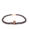 Garnet Bead Stretch Bracelet with Rose Gold Plate Skull
